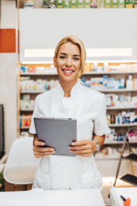 Pharmacist holding a tablet